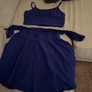 Two piece top and skirt with a tie
